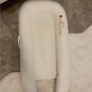 Dock A Tot Deluxe + never been used. Retails for $250, asking $125